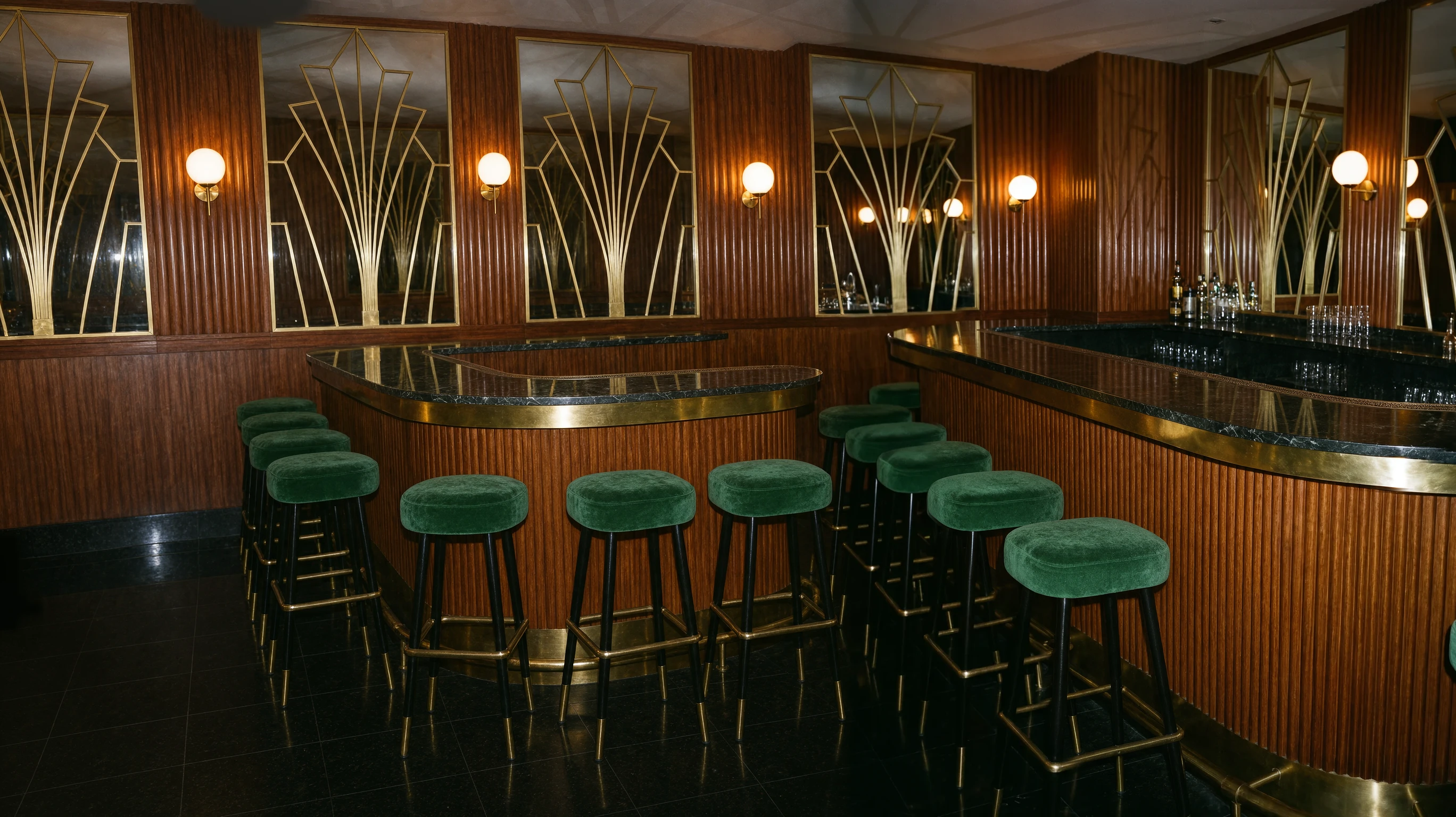 A woman in a cream knit sweater seated at a candlelit Art Deco bar, a silver bag on the counter.